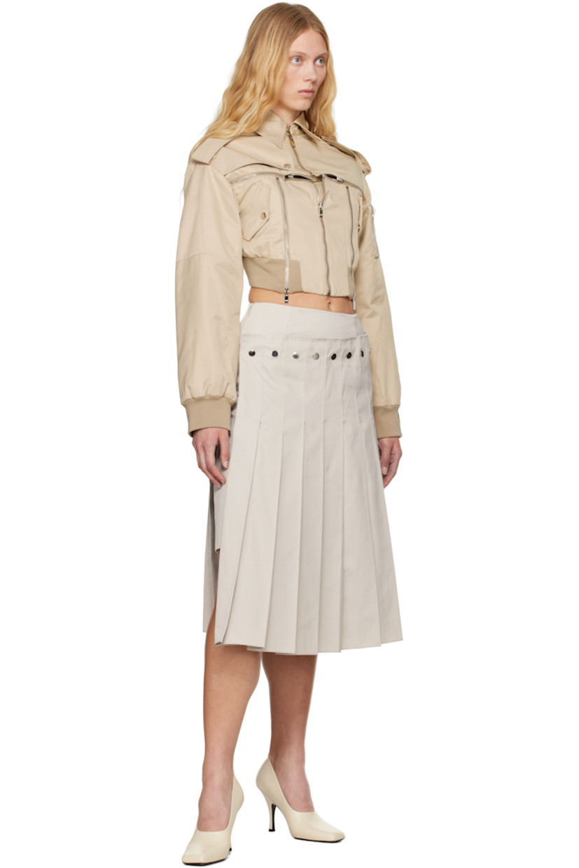 Polyester- and cotton-blend twill midi skirt. 

· Layered construction
· Raw edge and pleats at detachable overlay 
· Zip closure at side seam
· Concealed central vent at back hem 
· Full satin lining 

Supplier color: Oat beige