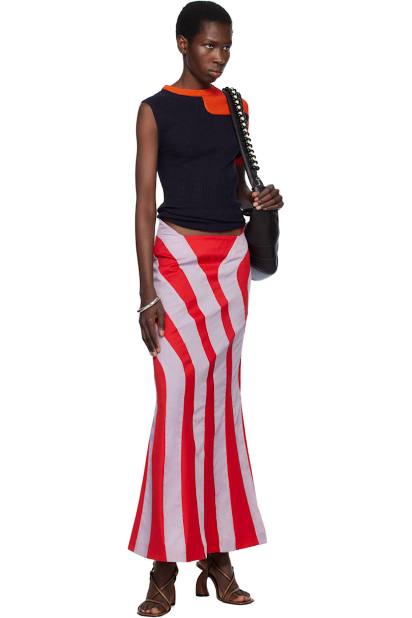 Cotton twill and broadcloth maxi skirt. Stripe pattern throughout.

· Paneled construction
· Asymmetrical waistband
· Flared hem
· Offset concealed zip closure at back

Supplier color: Red/Blue