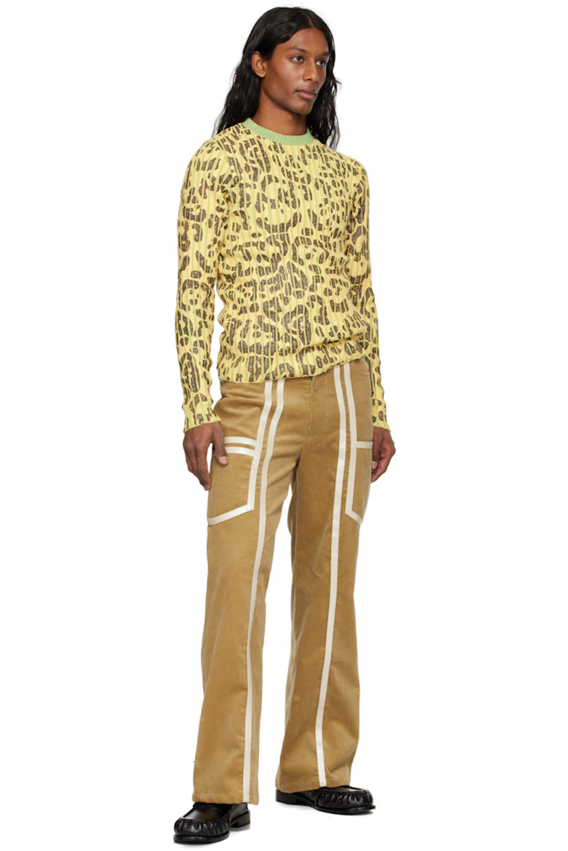 Cotton corduroy cargo pants. Leather trim throughout. 

· Belt loops
· Four-pocket styling
· Zip fly
· Patch pocket at outseams

Supplier color: Beige