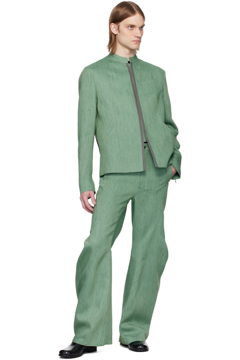 Nep virgin wool-blend barathea trousers. 

· Paneled construction
· Belt loops 
· Cinch tabs at waistband
· Four-pocket styling
· Zip fly
· Zip vent at back cuffs

Wholesale exclusivity at SSENSE.

Supplier color: Dark ivy