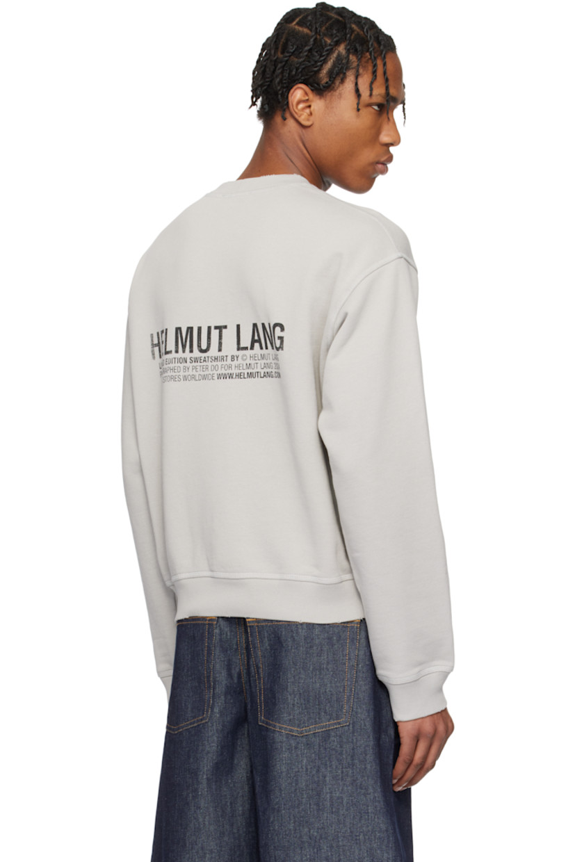 Enzyme-washed French terry sweatshirt. Overlock stitching throughout. 

· Distressing at rib-knit crewneck, hem, and cuffs
· Graphic printed at padded patch pocket
· Dropped shoulders
· Logo and text printed at back 

Featuring artwork by Peter Do.

Supplier color: Heather grey