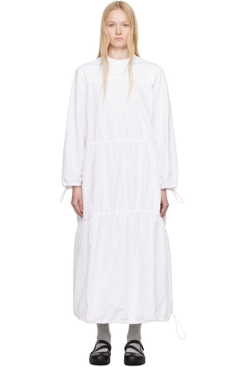 Garment-dyed cotton- and linen-blend twill maxi dress. Bungee-style drawstrings throughout. 

· Band collar
· Seam pockets
· Elasticized hem and cuffs
· Balloon sleeves 
· Button fastening at back collar

Supplier color: White