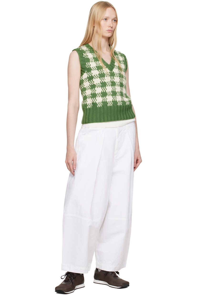 Hand-knit cotton vest. 

· Jacquard check pattern throughout 
· Rib-knit V-neck, hem, and armscyes

Supplier color: Green