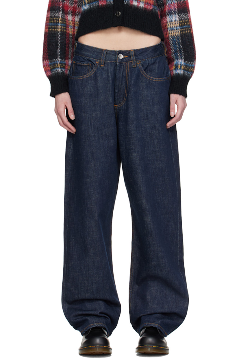 Rinse-washed non-stretch organic cotton selvedge denim jeans.

· Baggy-fit
· Belt loops
· Five-pocket styling
· Zip-fly
· Leather logo patch at back waistband
· Contrast stitching in tan 

Supplier color: Indigo