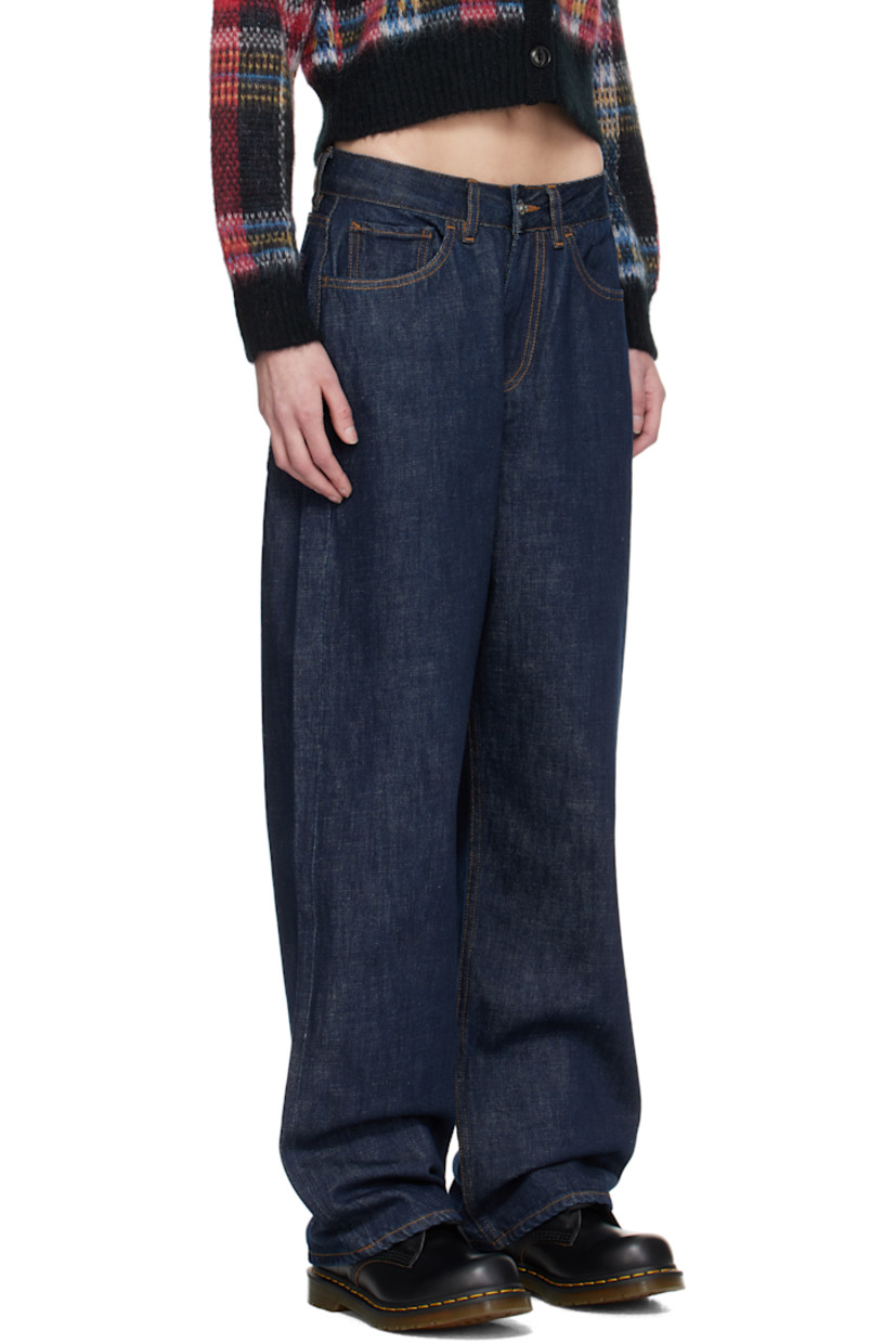 Rinse-washed non-stretch organic cotton selvedge denim jeans.

· Baggy-fit
· Belt loops
· Five-pocket styling
· Zip-fly
· Leather logo patch at back waistband
· Contrast stitching in tan 

Supplier color: Indigo