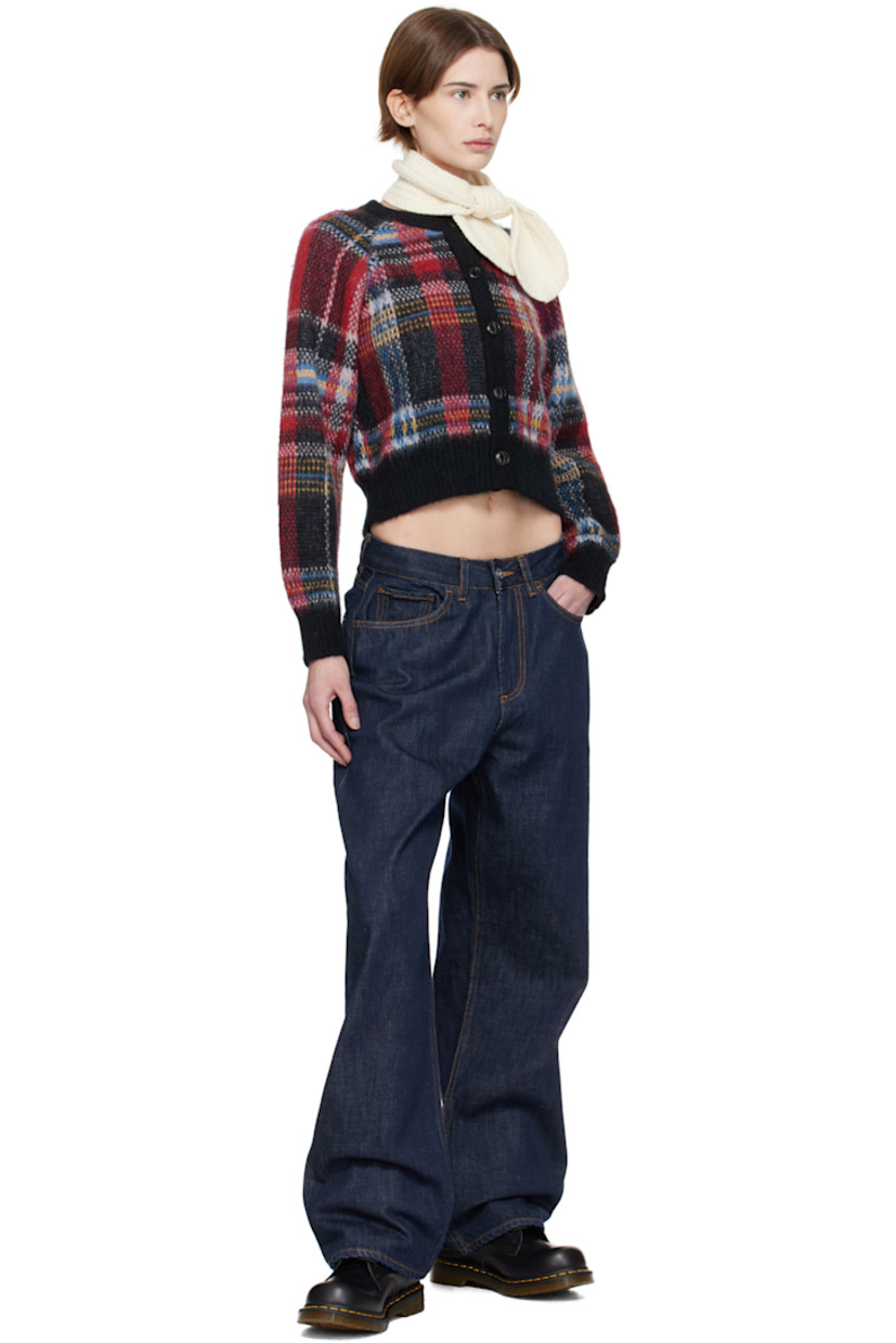 Rinse-washed non-stretch organic cotton selvedge denim jeans.

· Baggy-fit
· Belt loops
· Five-pocket styling
· Zip-fly
· Leather logo patch at back waistband
· Contrast stitching in tan 

Supplier color: Indigo
