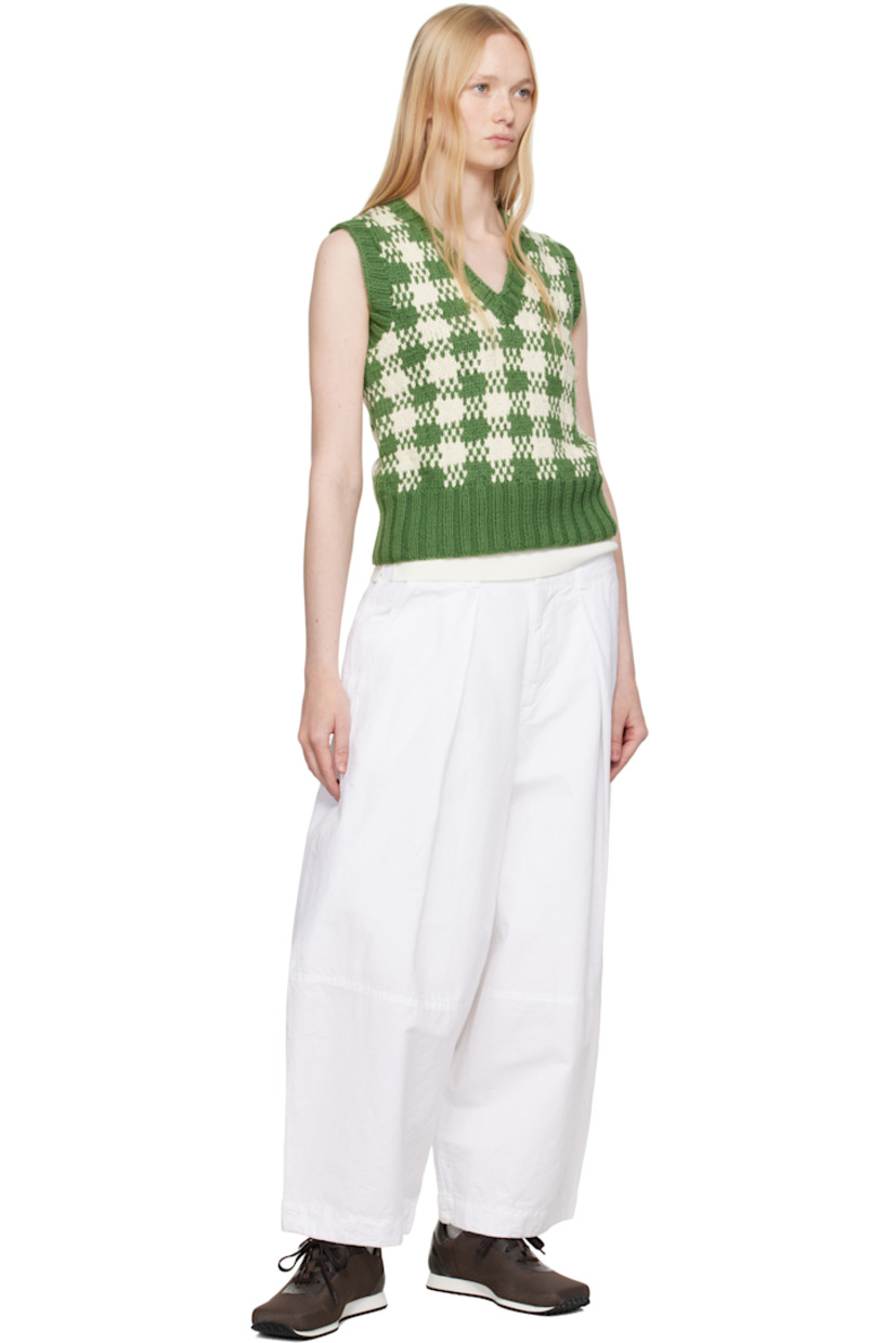 Garment-dyed crinkled cotton- and linen-blend twill trousers. 

· Loose-fit and wide-leg 
· High-rise 
· Belt loops
· Four-pocket styling
· Zip fly
· Pleats at front 
· Corozo hardware 

Supplier color: White
