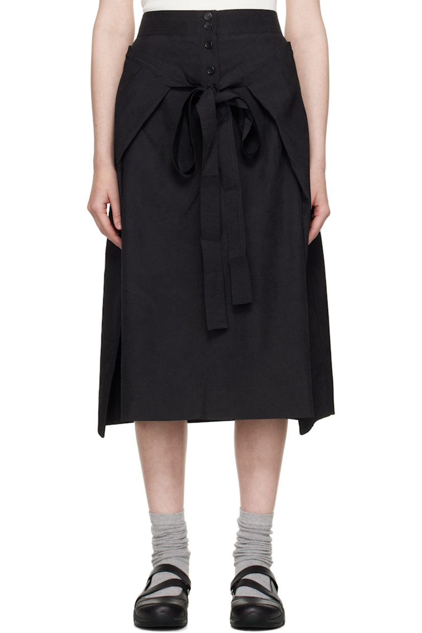Crinkled polyester taffeta midi skirt. Integrated self-tie panel for alternate styling.

· Wrap construction 
· Four-pocket styling
· Pleats at front 
· Button closure at back
· Corozo hardware

Supplier color: Black