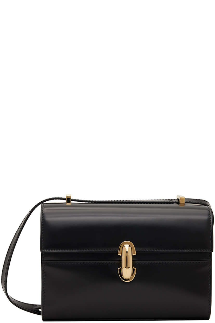 Polished calfskin shoulder bag in black.

· Adjustable sliding crossbody strap 
· Turn-lock flap
· Patch pocket at two-compartment interior
· Buffed calfskin lining
· H5.25" x W7.5" x D2.75"

Supplier color: Black