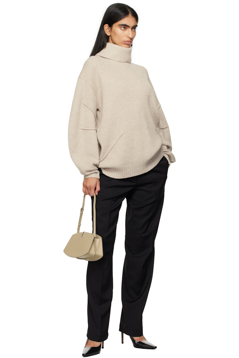Buffed calfskin shoulder bag in beige.

· Adjustable shoulder strap 
· Silver-tone hardware at face 
· Accordion panel at sides
· Logo stamp at back face 
· Magnetic tab closure 
· Card slot at two-compartment interior
· Buffed calfskin lining 
· H5.75" x W10.75 x D4"

Supplier color: Clay