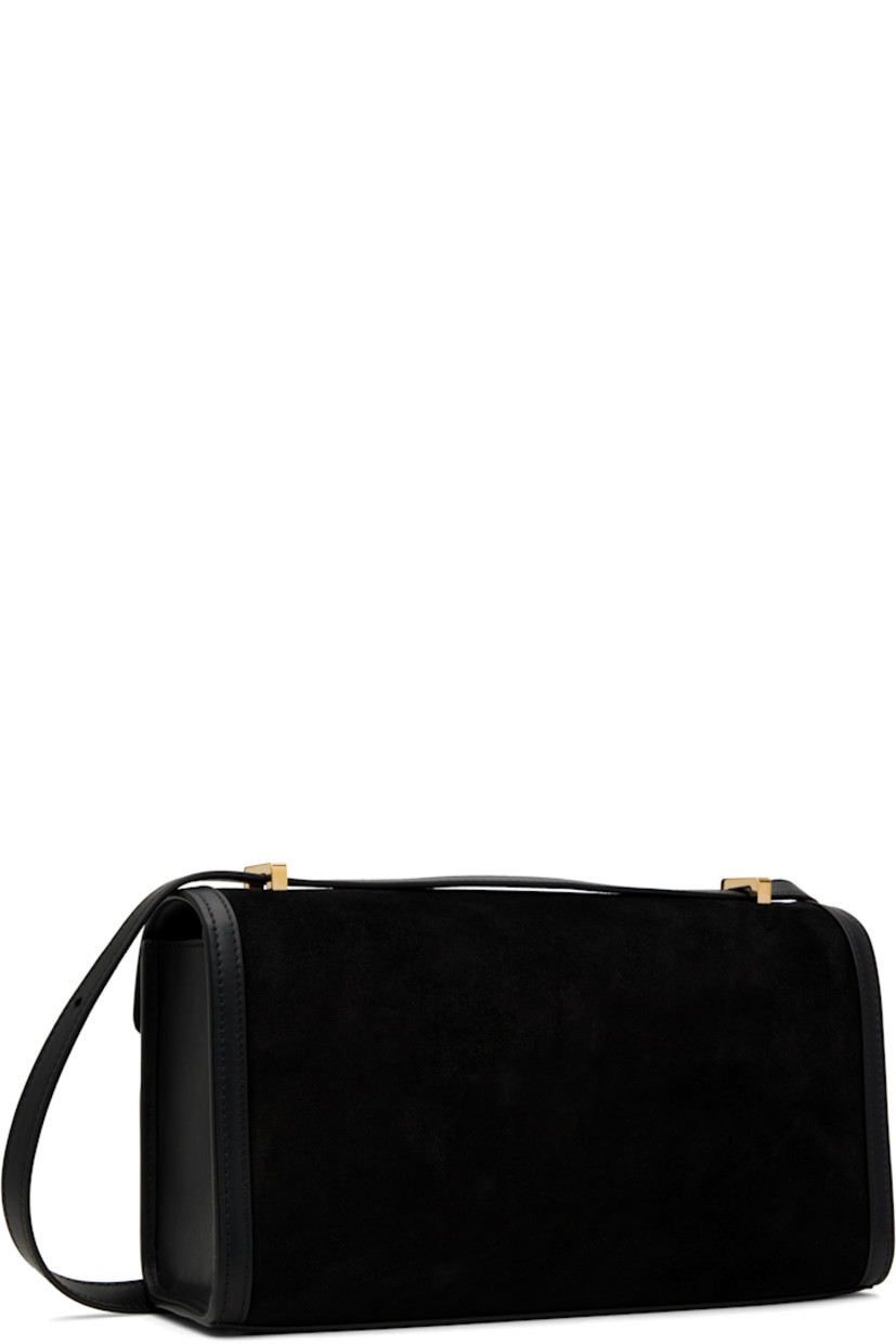 Calfskin suede shoulder bag in black.

· Buffed calfskin trim throughout.
· Convertible crossbody strap
· Bumper studs at base
· Turn-lock flap
· Patch pocket at interior
· Buffed calfskin lining
· H5.5" x W10" x D3"

Supplier color: Black