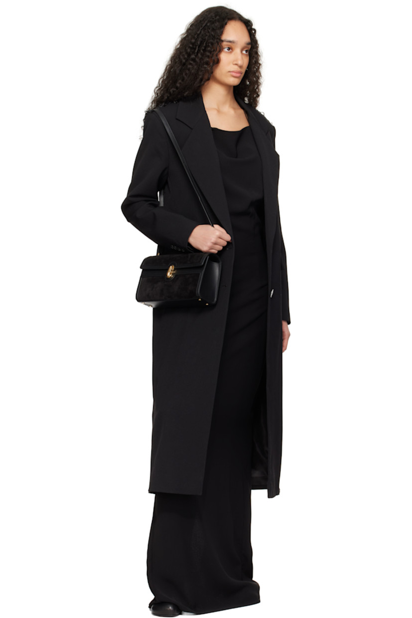 Calfskin suede shoulder bag in black.

· Buffed calfskin trim throughout.
· Convertible crossbody strap
· Bumper studs at base
· Turn-lock flap
· Patch pocket at interior
· Buffed calfskin lining
· H5.5" x W10" x D3"

Supplier color: Black