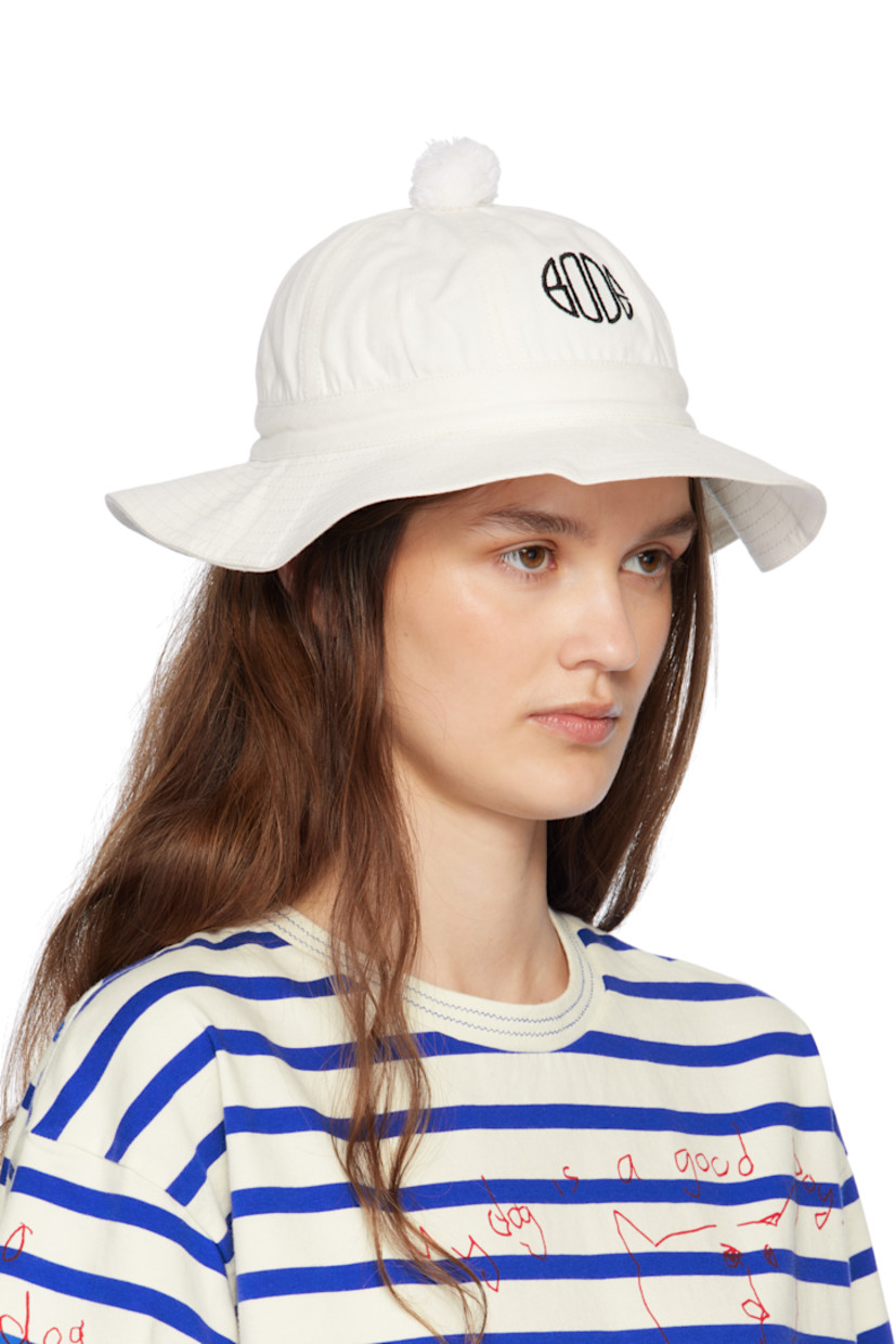 Cotton canvas bucket hat in white.

· Pom-pom at crown
· Logo embroidered at face
· Quilted brim
· Unlined

Supplier color: White