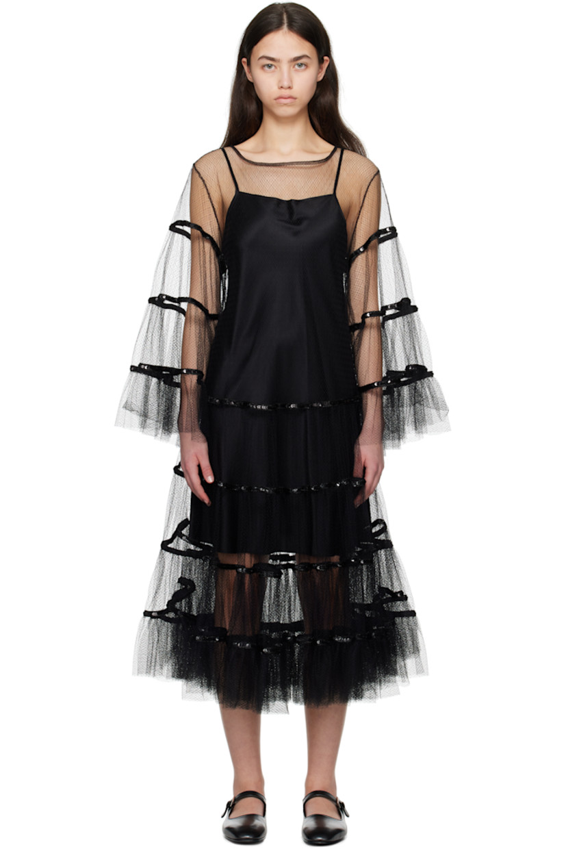 Sheer nylon tulle midi dress. 

· Boatneck
· Sequinned detailing at skirt and sleeves
· Ruffled trim at hem and cuffs
· Button keyhole at back collar
· Removable silk satin slip-style underlay

This item is part of a limited run of 4.

Supplier color: Black