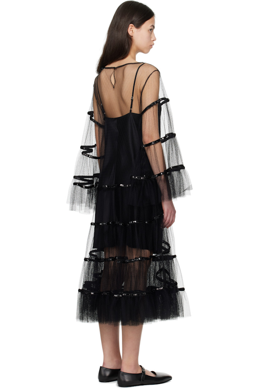 Sheer nylon tulle midi dress. 

· Boatneck
· Sequinned detailing at skirt and sleeves
· Ruffled trim at hem and cuffs
· Button keyhole at back collar
· Removable silk satin slip-style underlay

This item is part of a limited run of 4.

Supplier color: Black