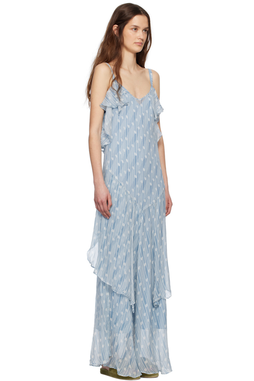 Semi-sheer silk gauze maxi dress. Ruffled trim, stripes, and polka dot pattern throughout.

· Plunging V-neck
· Fixed spaghetti straps
· Removable silk crêpe slip-style lining

This item is part of a limited run of 30.

Supplier color: Blue
