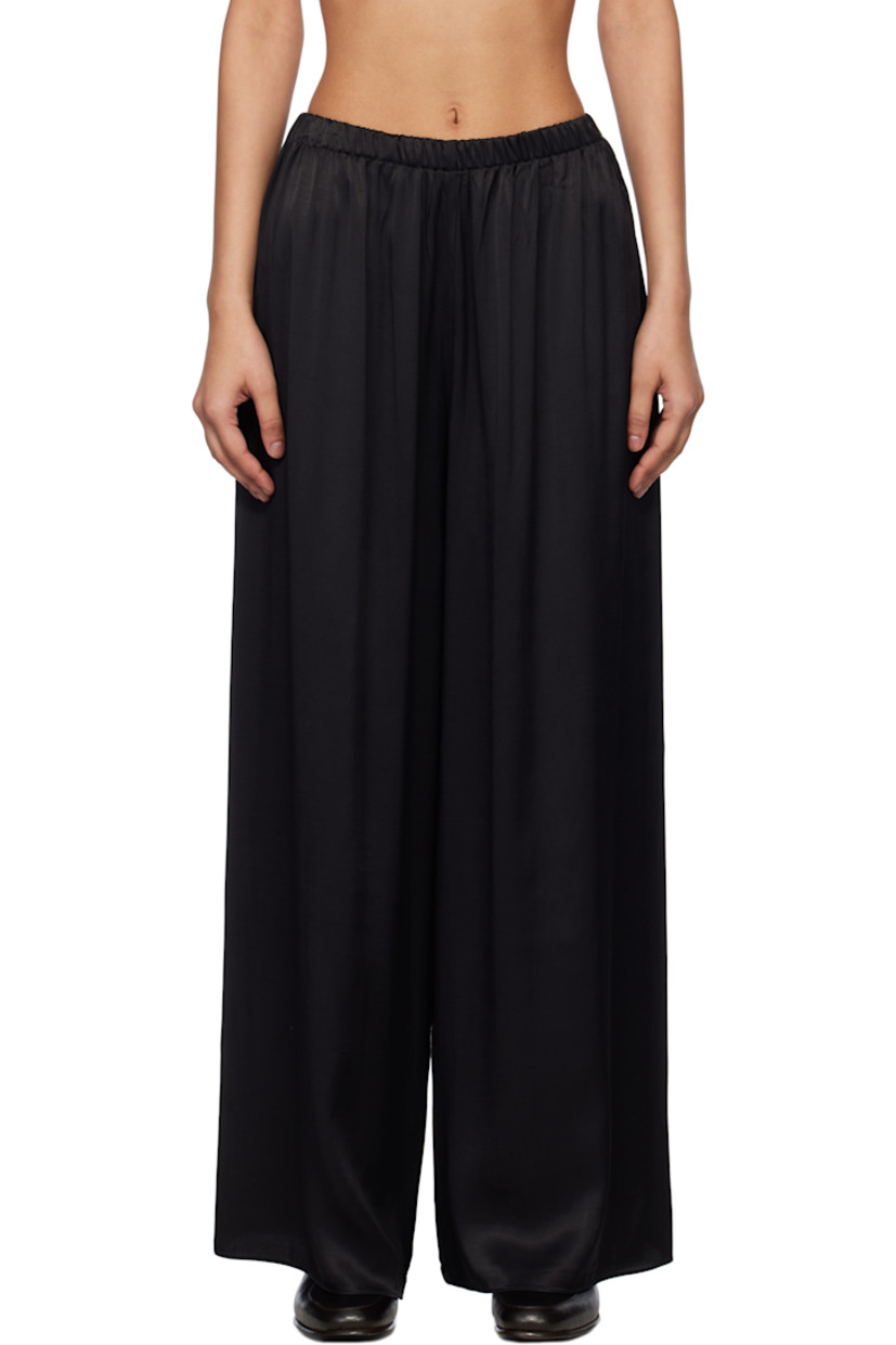 Loose-fit viscose satin trousers. Elasticized waistband.

This item is part of a limited run of 90.

Supplier color: Black