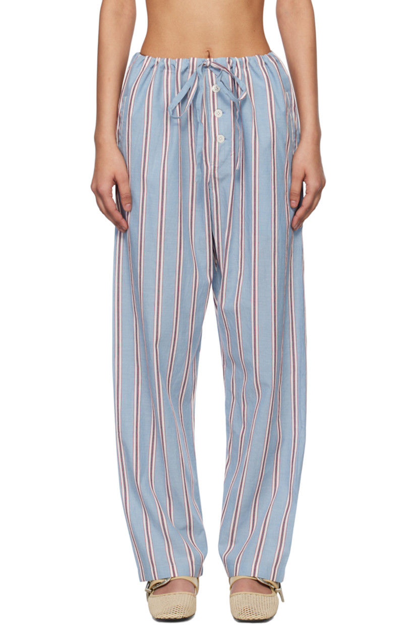Cotton poplin pyjama pants. Stripes throughout.

· Drawstring at waistband
· Three-pocket styling
· Exposed button fly
· Text patch at back pocket

This item is part of a limited run of 70.

Supplier color: Blue