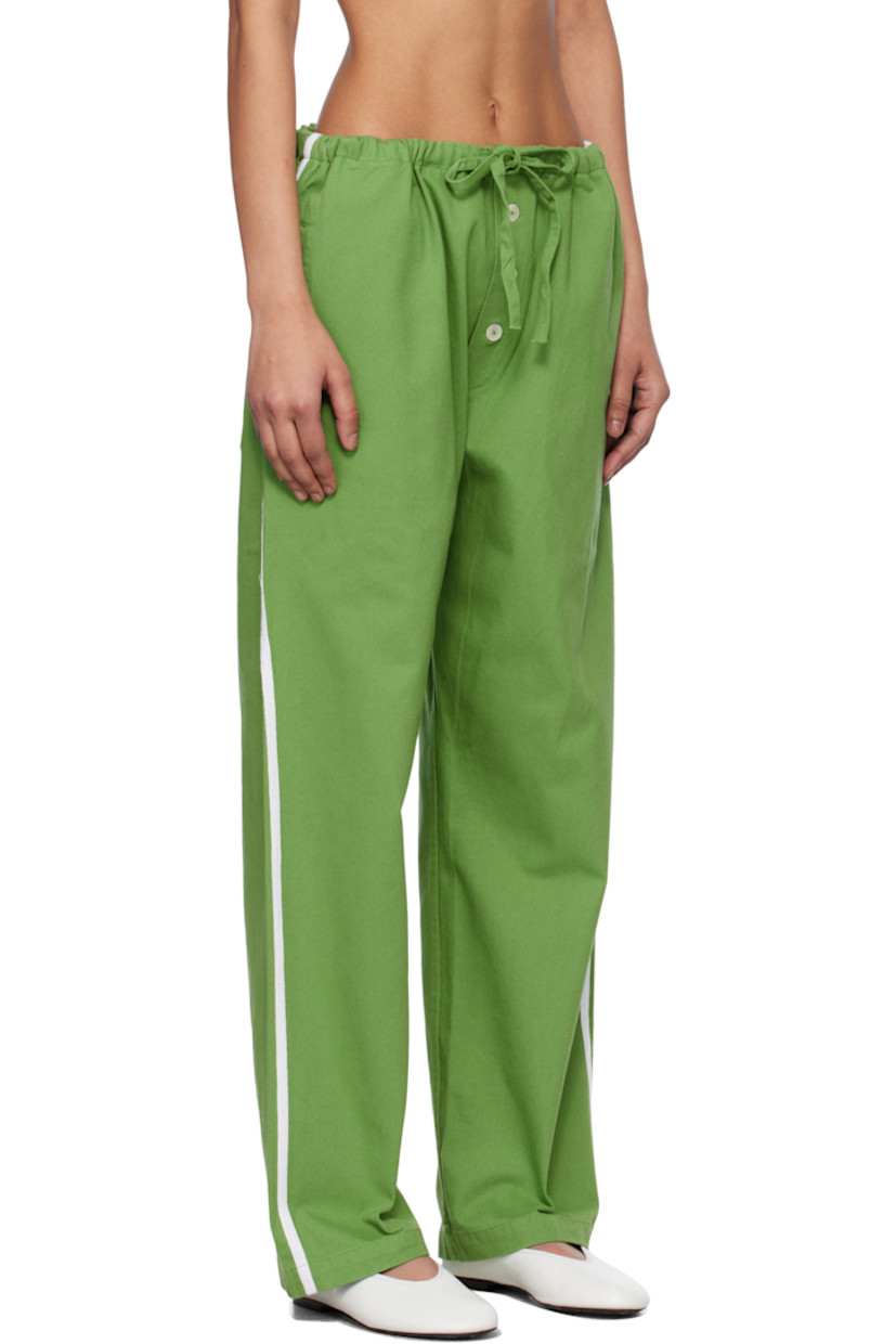 Cotton twill trousers.

· Drawstring at waistband
· Three-pocket styling
· Exposed button fly
· Striped trim at outseams

This item is part of a limited run of 50.

Supplier color: Green/White