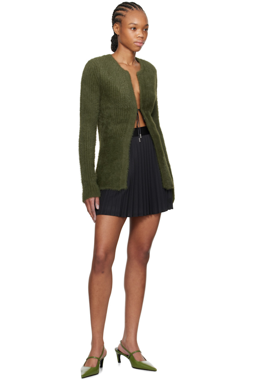 Stretch polyester piqué miniskirt. Knife pleats throughout.

· Striped trim at waistband
· Logo embroidered at front
· Concealed zip closure at side

This item is part of a limited run of 100.

Supplier color: Black/Black