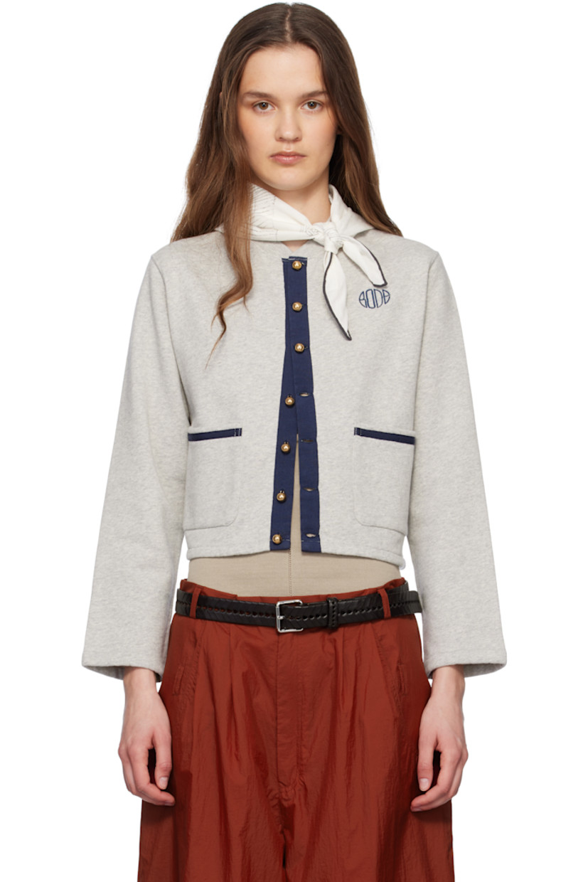 French terry cardigan.

· Rib-knit stand collar
· Graphic hardware at button closure
· Logo embroidered at chest
· Patch pockets

This item is part of a limited run of 70.

Supplier color: Grey