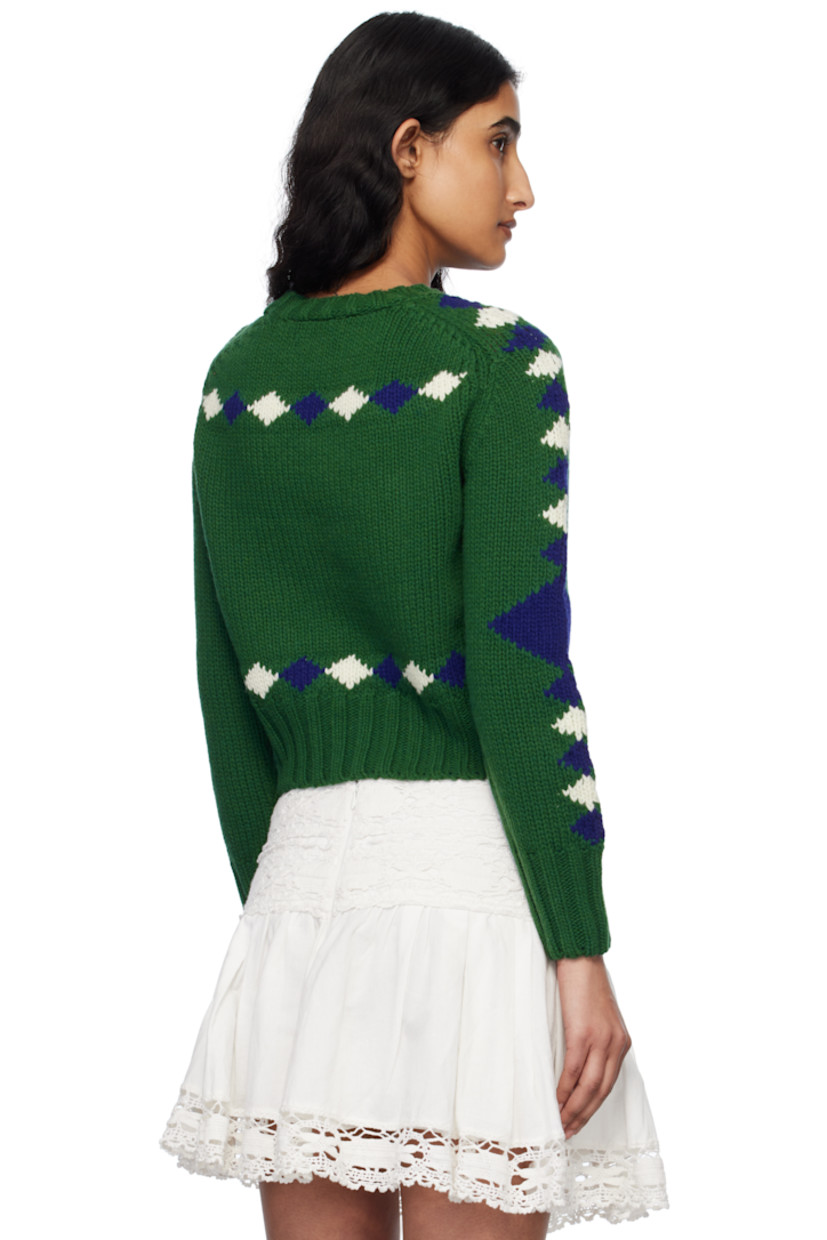 Knit merino wool sweater. Jacquard graphic pattern throughout.

· Rib-knit crewneck, hem, and cuffs
· Intarsia graphic at front
· Saddle shoulders

This item is part of a limited run of 90.

Supplier color: Green