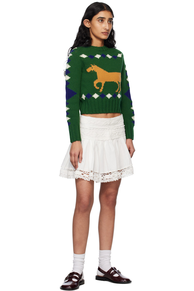 Knit merino wool sweater. Jacquard graphic pattern throughout.

· Rib-knit crewneck, hem, and cuffs
· Intarsia graphic at front
· Saddle shoulders

This item is part of a limited run of 90.

Supplier color: Green