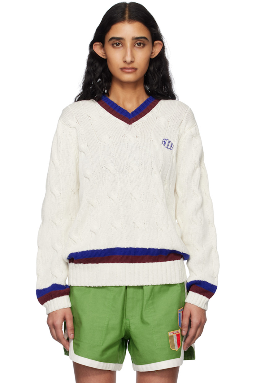 Cable-knit cotton sweater.

· Stripes at rib-knit V-neck, hem, and cuffs
· Logo embroidered at chest
· Dropped shoulders

This item is part of a limited run of 60.

Supplier color: Cream