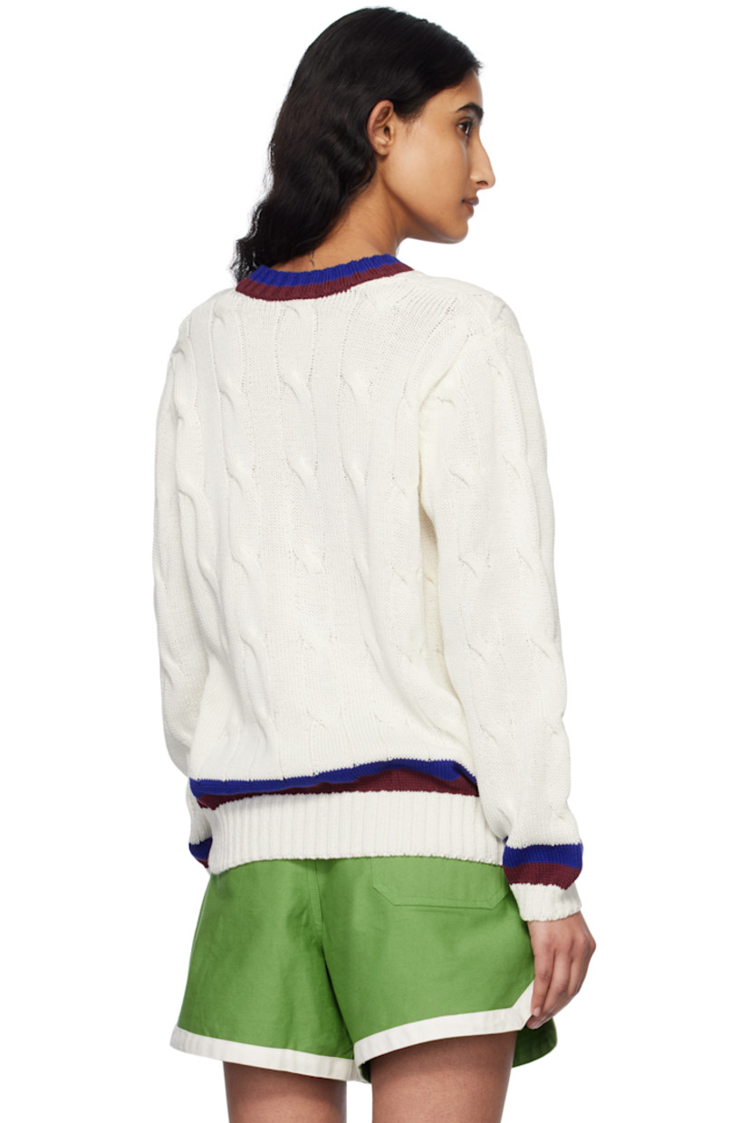 Cable-knit cotton sweater.

· Stripes at rib-knit V-neck, hem, and cuffs
· Logo embroidered at chest
· Dropped shoulders

This item is part of a limited run of 60.

Supplier color: Cream