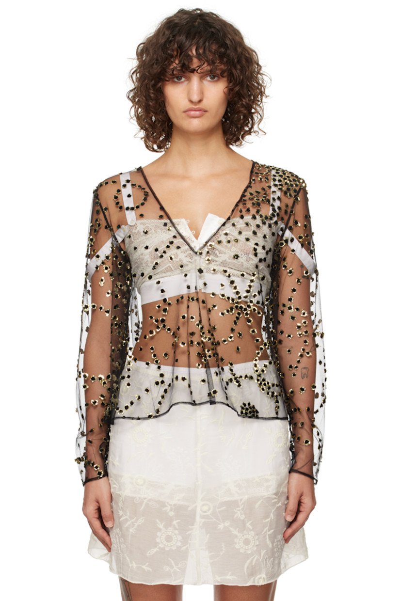 Semi-sheer polyester-blend mesh blouse. Foil appliqués throughout.

· V-neck
· Hook-eye fastening at open back

Supplier color: Black