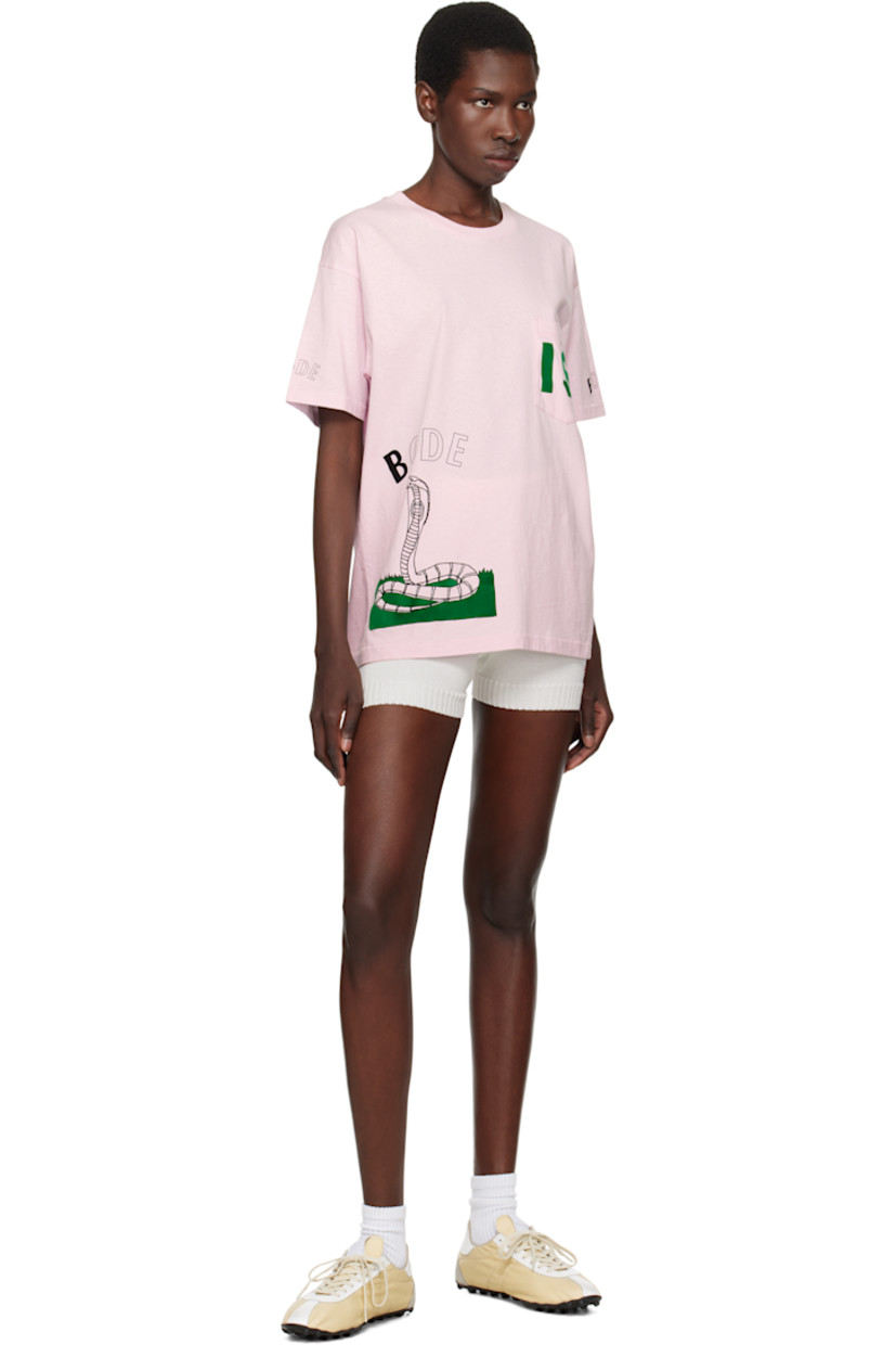 Cotton jersey T-shirt. 

· Rib-knit crewneck
· Patch pocket at chest
· Felted text and graphic at front 
· Logo and graphic printed at front hem 
· Logo printed at sleeves and back hem 

This item is part of a limited run of 160.

Supplier color: Pink