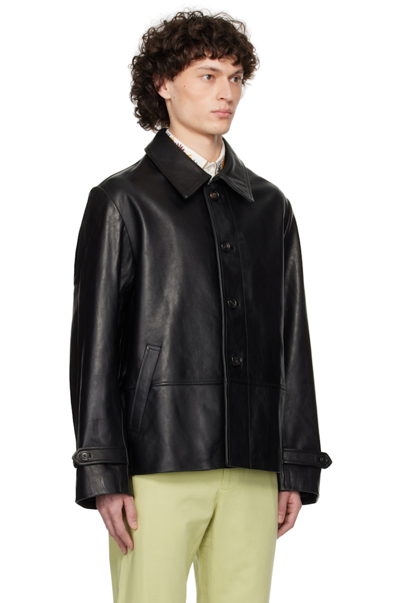 Grained leather jacket. 

· Paneled construction 
· Spread collar 
· Buttoned tab for stand collar-styling
· Button closure 
· Welt pockets at front 
· Adjustable button tab at cuffs 
· Locker loop at interior collar
· Welt pocket at interior 
· Full twill lining
· Horn hardware

This item is part of a limited run of 70.

Supplier color: Black