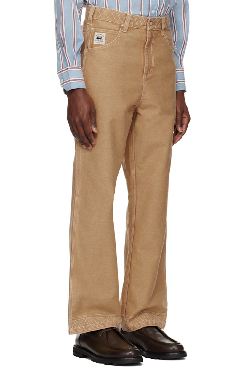 Cotton twill trousers.

· Belt loops and embroidered detailing at waistband
· Five-pocket styling
· Zip fly
· Logo patch at coin pocket
· Logo-embroidered hammer loop at outseam
· Patch pocket at outseam
· Contrast stitching in white

This item is part of a limited run of 86.

Supplier color: Brown