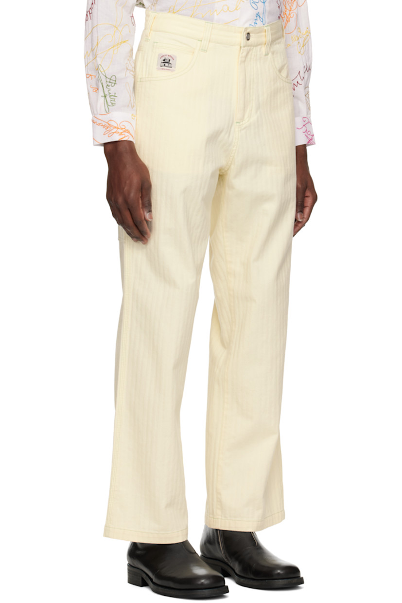 Cotton herringbone trousers.

· Belt loops
· Five-pocket styling
· Zip fly
· Logo patch at coin pocket and back
· Hammer loop at outseam
· Patch pocket at outseam
· Contrast stitching in green

This item is part of a limited run of 95.

Supplier color: Ivory