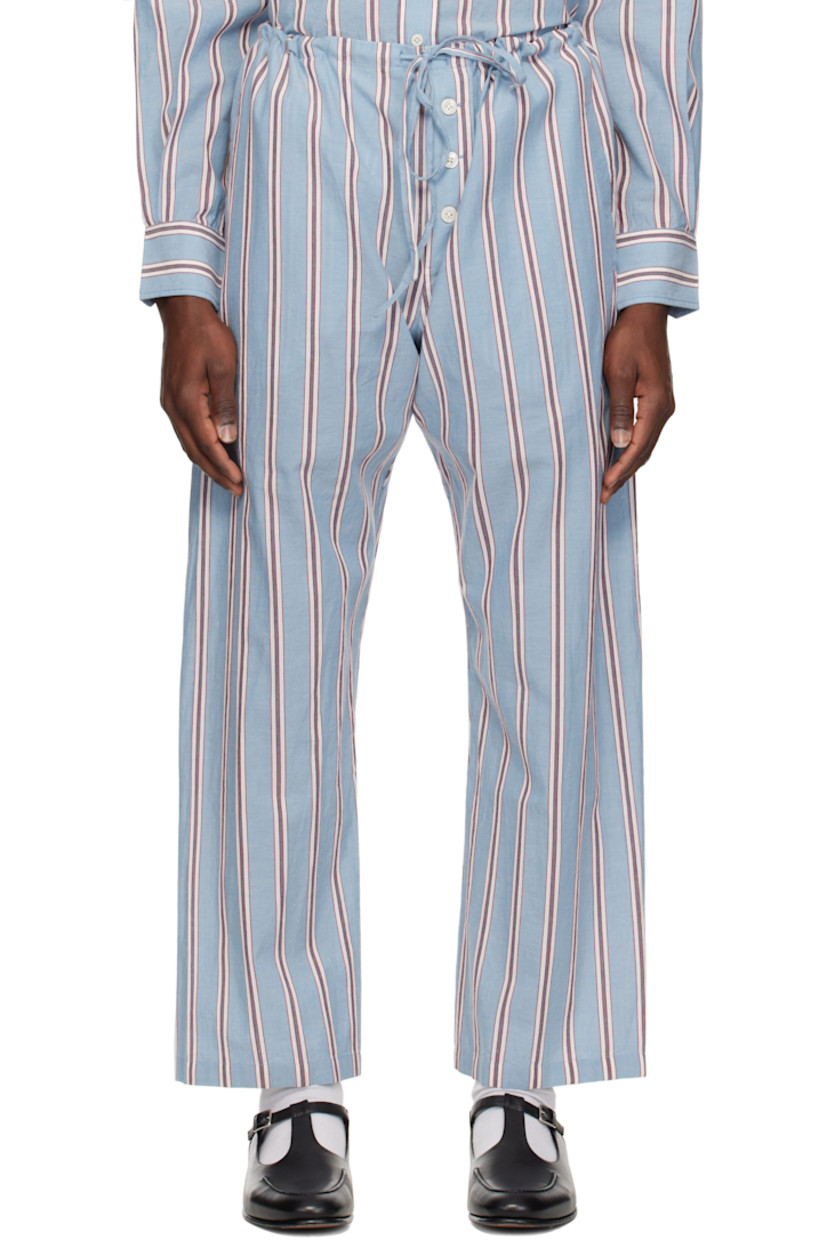 Cotton poplin pyjama pants. Stripes throughout.

· Drawstring at waistband
· Three-pocket styling
· Exposed button fly

This item is part of a limited run of 70.

Supplier color: Blue