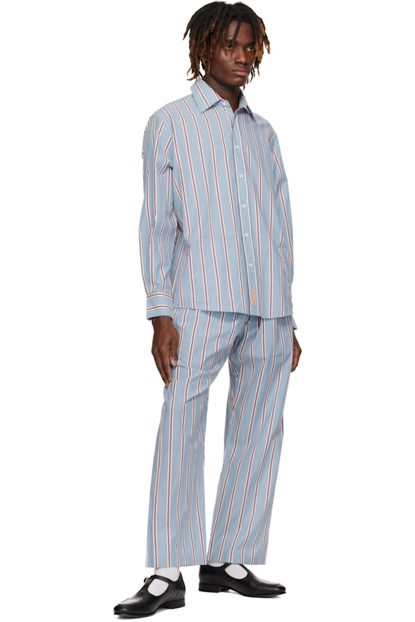 Cotton poplin pyjama pants. Stripes throughout.

· Drawstring at waistband
· Three-pocket styling
· Exposed button fly

This item is part of a limited run of 70.

Supplier color: Blue