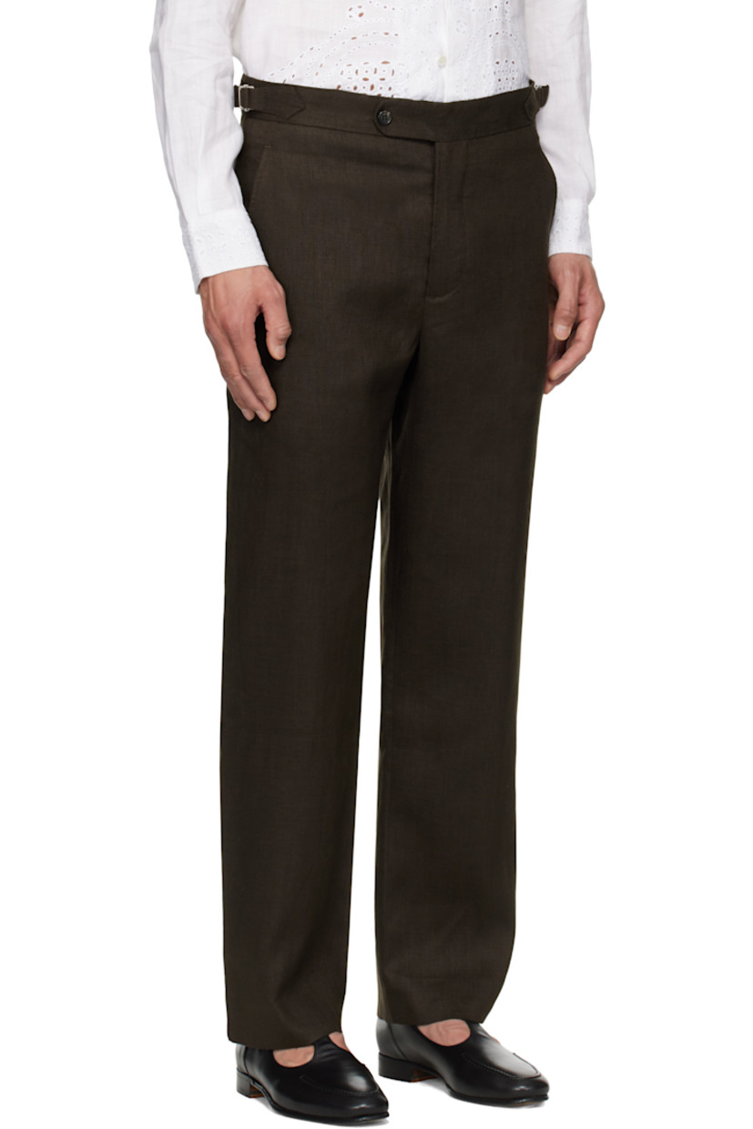 Lightweight plain-woven linen trousers. 

· Cinch tabs at waistband 
· Four-pocket styling 
· Zip fly 
· Darts at back 
· Full satin lining 

This item is part of a limited run of 185.

Supplier color: Brown/Black