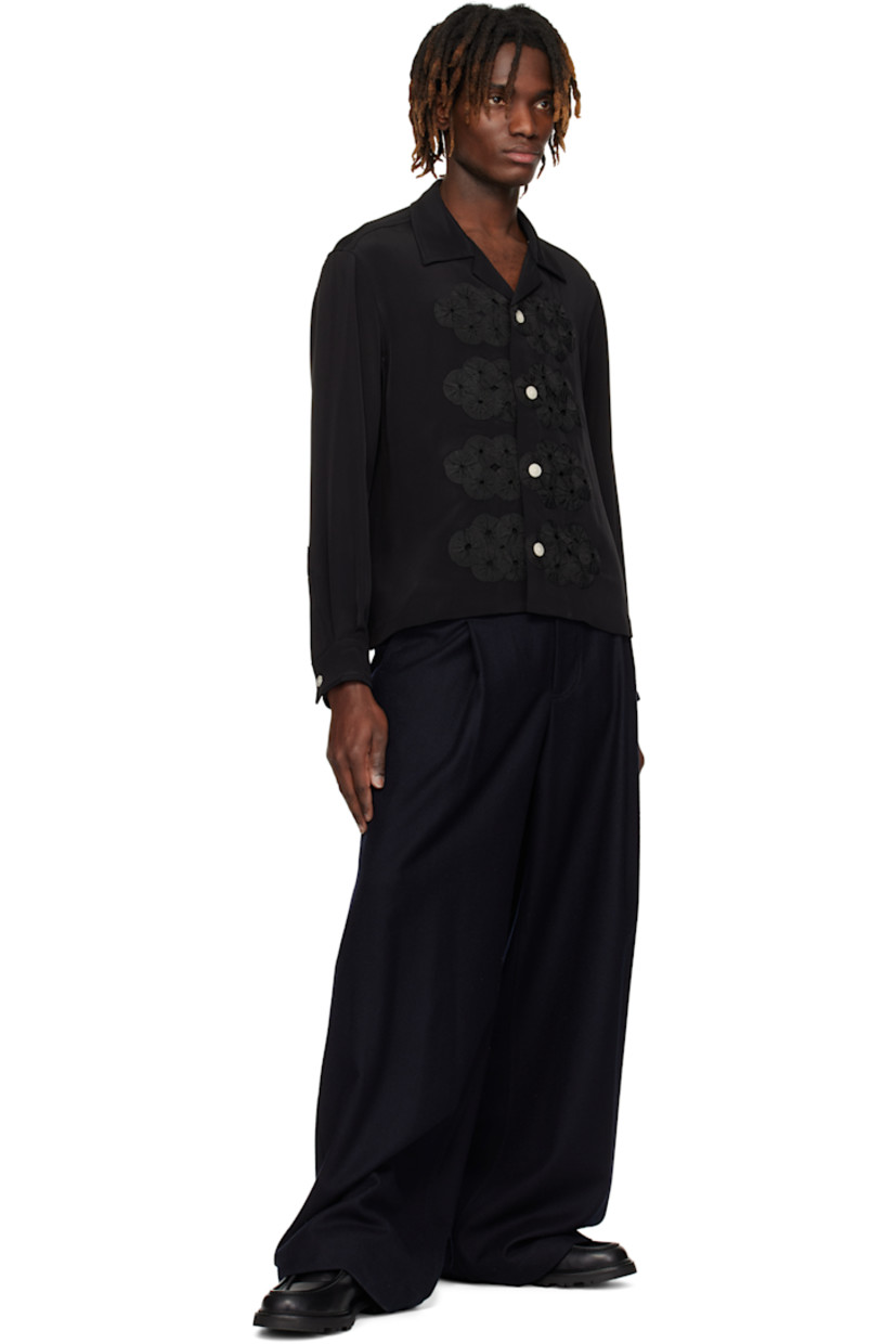 Silk satin shirt.

· Open spread collar
· Button closure
· Gathered ribbon appliqués at front
· Buttoned barrel cuffs

This item is part of a limited run of 71.

Supplier color: Black