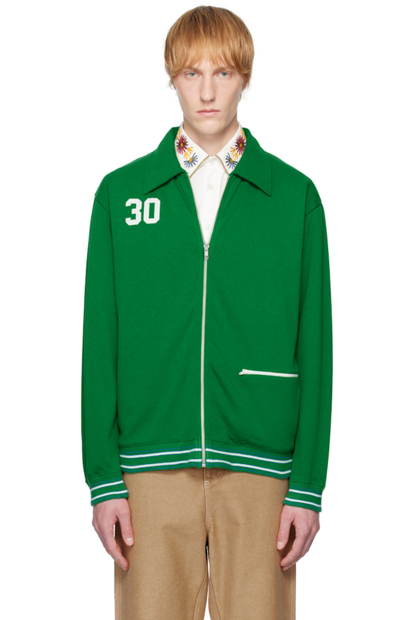 Heavyweight knit cotton- and lyocell-blend jacket. 

· Spread collar
· Zip closure
· Text appliqués at chest
· Zip pocket at front 
· Striped rib-knit hem and cuffs
· Text printed at back 
· Full jersey lining

This item is part of a limited run of 90.

Supplier color: Green