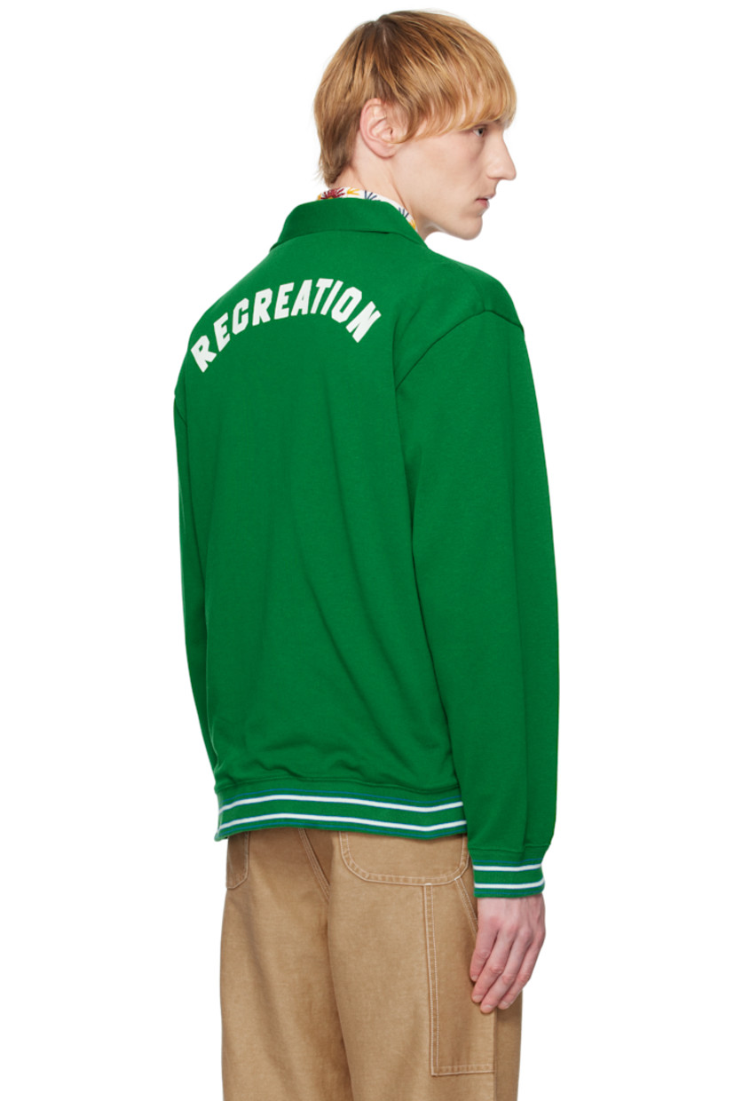 Heavyweight knit cotton- and lyocell-blend jacket. 

· Spread collar
· Zip closure
· Text appliqués at chest
· Zip pocket at front 
· Striped rib-knit hem and cuffs
· Text printed at back 
· Full jersey lining

This item is part of a limited run of 90.

Supplier color: Green