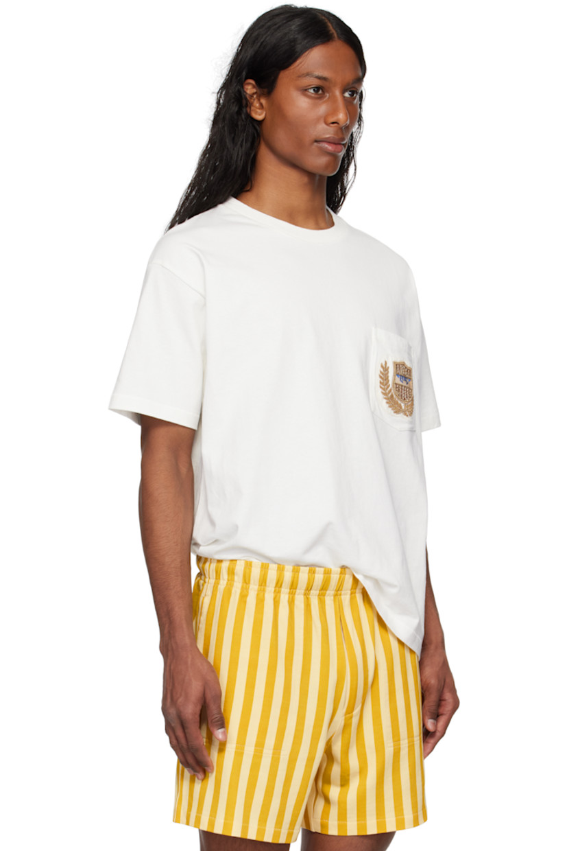 Cotton jersey T-shirt.

· Rib-knit crewneck
· Beaded logo appliqué at patch pocket

This item is part of a limited run of 290.

Supplier color: Cream