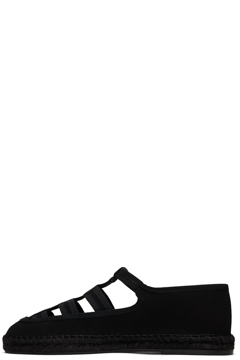 Cotton canvas espadrilles in black.

· Pin-buckle strap and cutouts at vamp
· Grained leather lining
· Blanket stitching at welt
· Hand-sewn braided jute midsole
· Treaded nubuck sole

Supplier color: Black