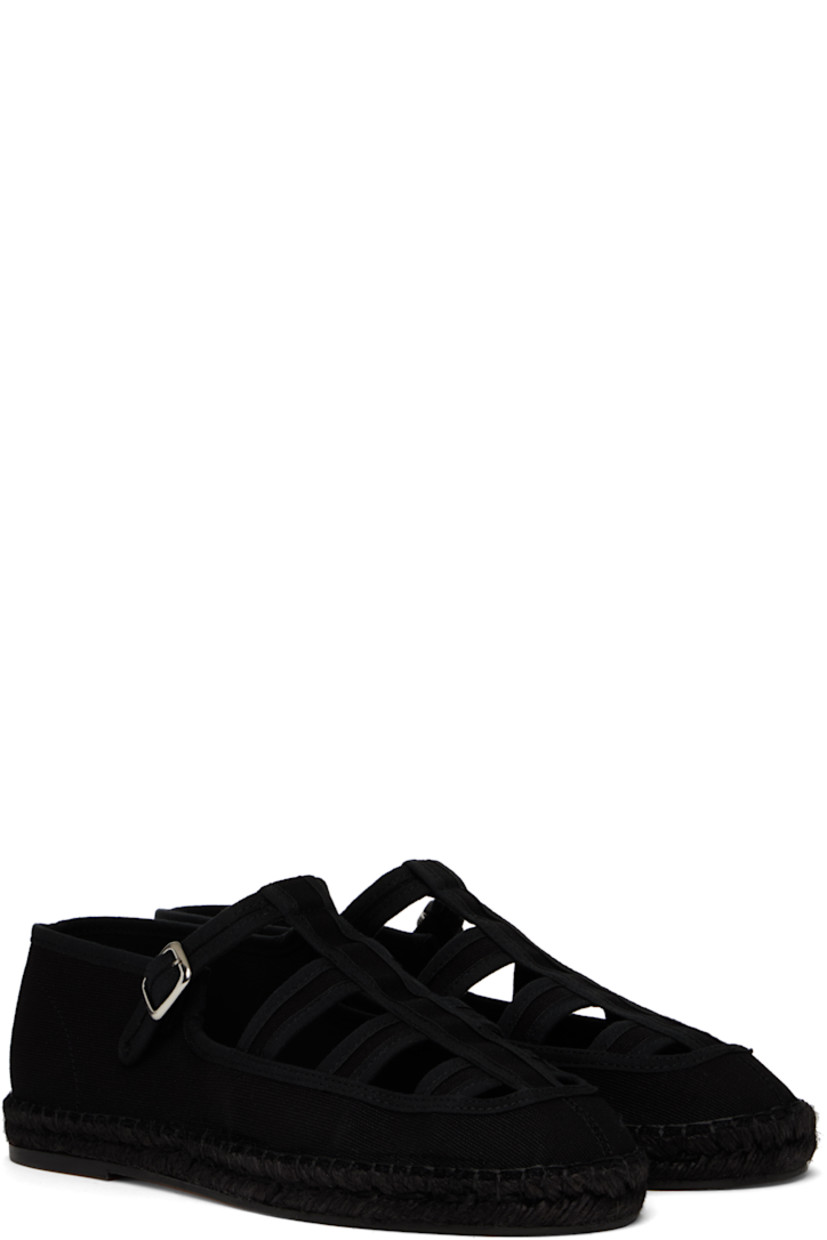 Cotton canvas espadrilles in black.

· Pin-buckle strap and cutouts at vamp
· Grained leather lining
· Blanket stitching at welt
· Hand-sewn braided jute midsole
· Treaded nubuck sole

Supplier color: Black