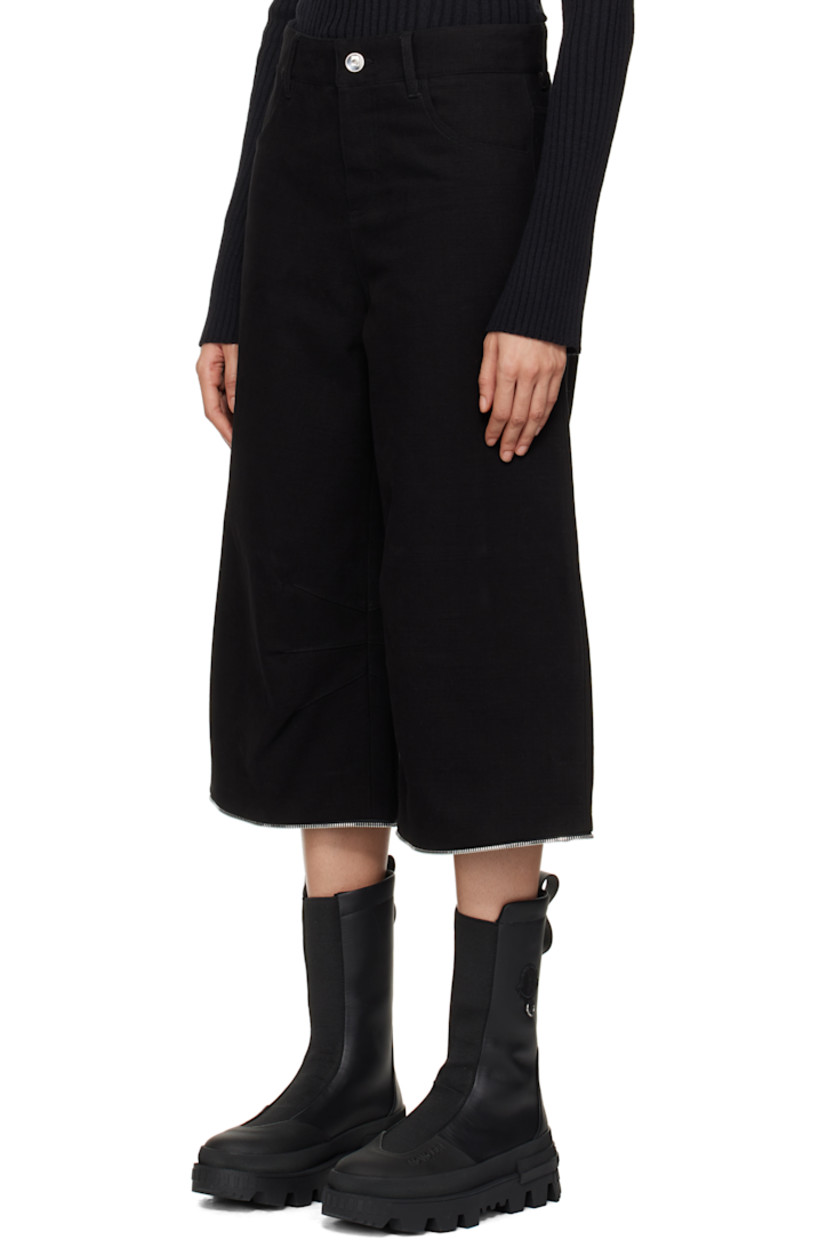 Cotton canvas trousers.

· Belt loops
· Five-pocket styling
· Zip-fly
· Darts at inseam
· Detachable zip panel at legs for alternate styling
· O-ring at back waistband

Part of the Moncler Genius x Willow Smith collaboration.

Supplier color: Black