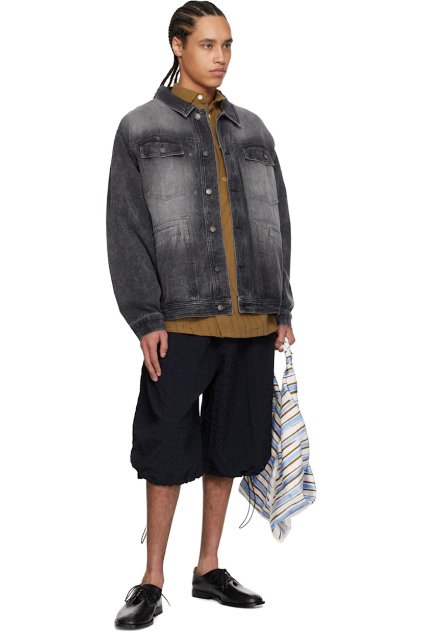 Loose-fit non-stretch denim jacket. Fading throughout.

· Spread collar
· Button closure
· Flap and welt pockets
· Dropped shoulders
· Buttoned barrel cuffs
· Hand-embroidered graphic at back
· Adjustable button tabs at back hem
· Logo-engraved gunmetal-tone hardware

Supplier color: Black