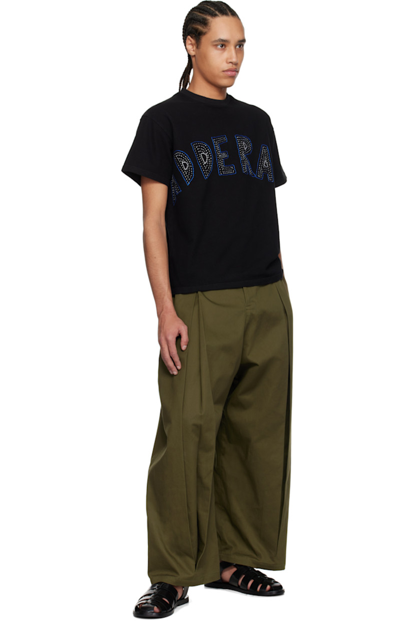 Cotton jersey T-shirt.

· Rib-knit crewneck
· Hand-embroidered text at chest
· Cropped hem
· Dropped shoulders

Supplier color: Black