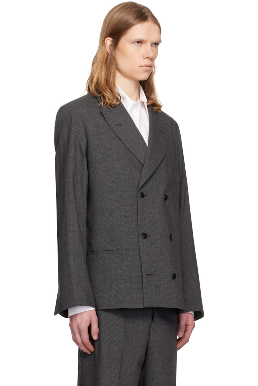 Stretch wool-blend flannel blazer. Houndstooth pattern throughout.

· Peaked lapel
· Double-breasted button closure
· Patch pocket at chest
· Welt pockets at front
· Padded shoulders
· Vented cuffs
· Darts at back shoulders
· Welt pockets at interior
· Full satin lining

Supplier color: Dark grey