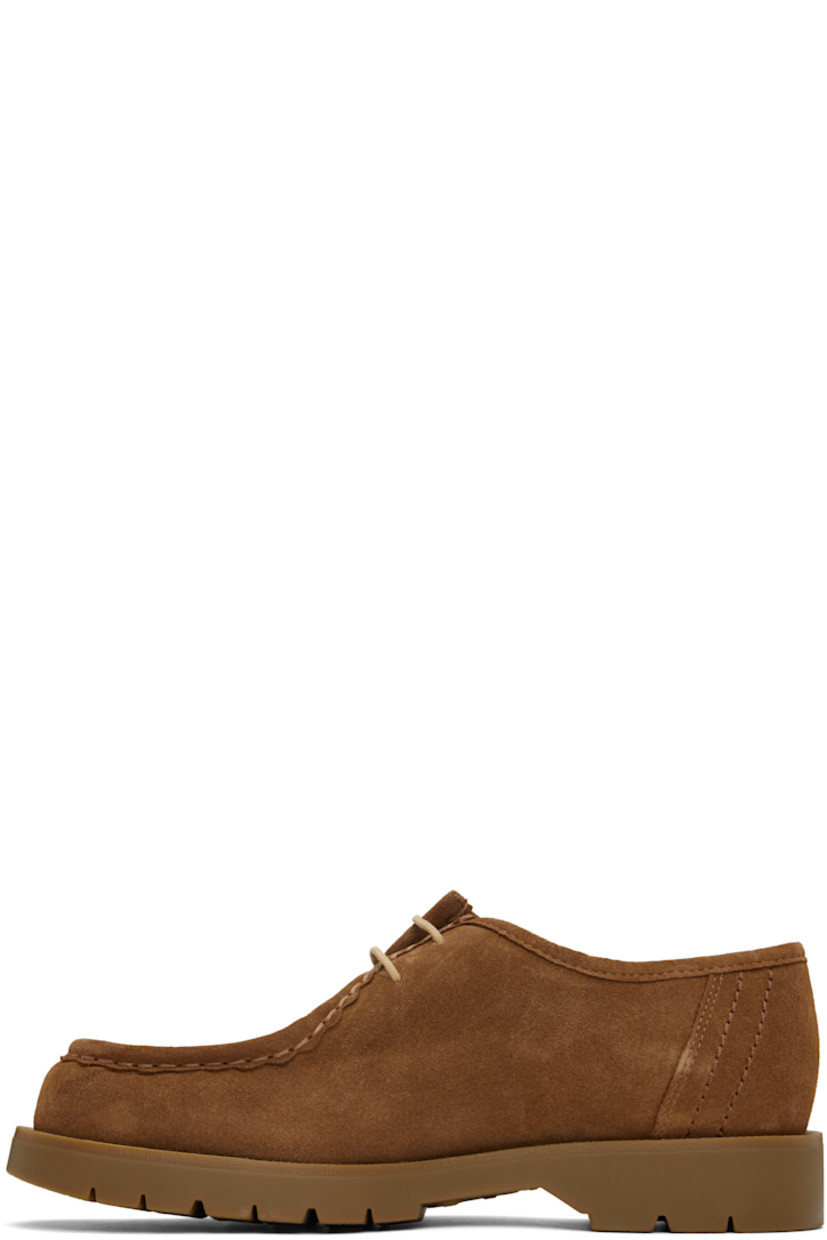 LWG-certified suede derbys in tan.

· Scalloped edge at moc toe
· Lace-up closure
· Grained leather and microfiber lining
· Serrated detailing at welt
· Treaded rubber sole

Supplier color: Cognac