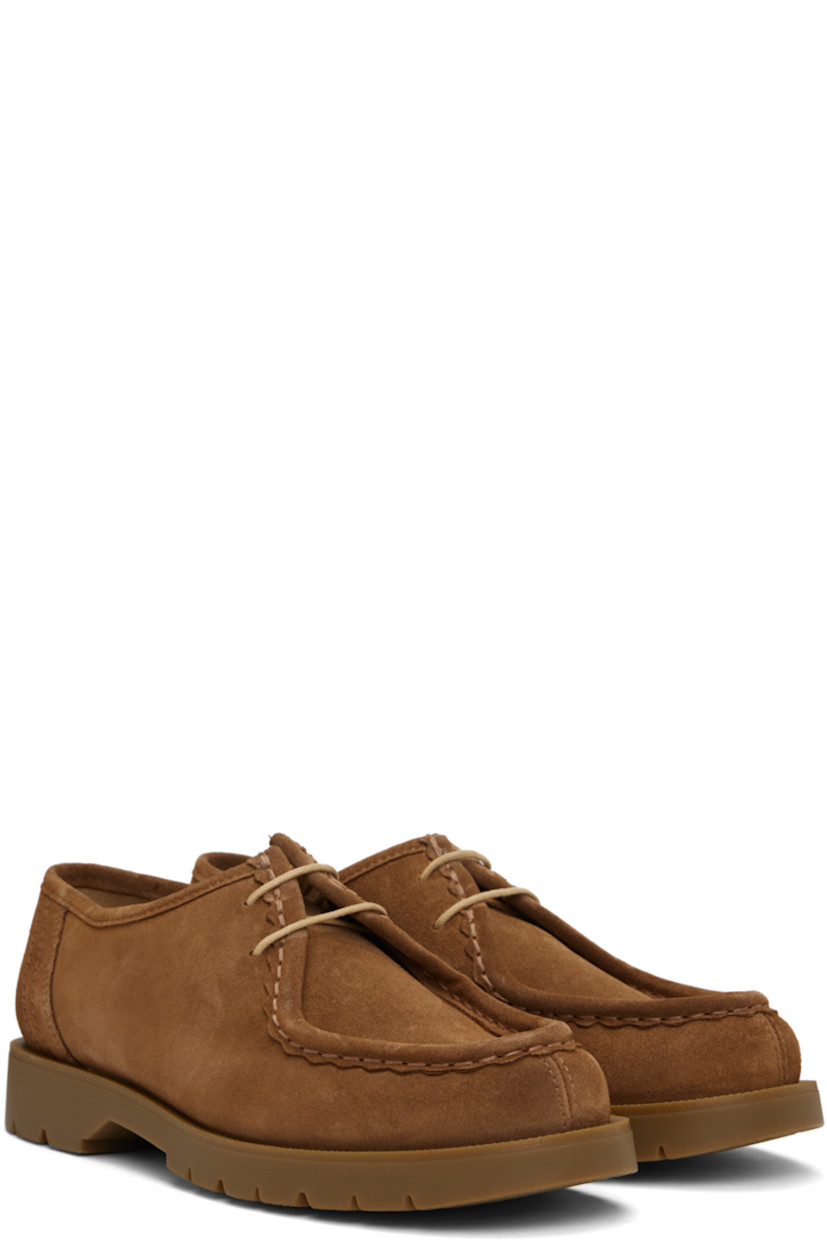 LWG-certified suede derbys in tan.

· Scalloped edge at moc toe
· Lace-up closure
· Grained leather and microfiber lining
· Serrated detailing at welt
· Treaded rubber sole

Supplier color: Cognac