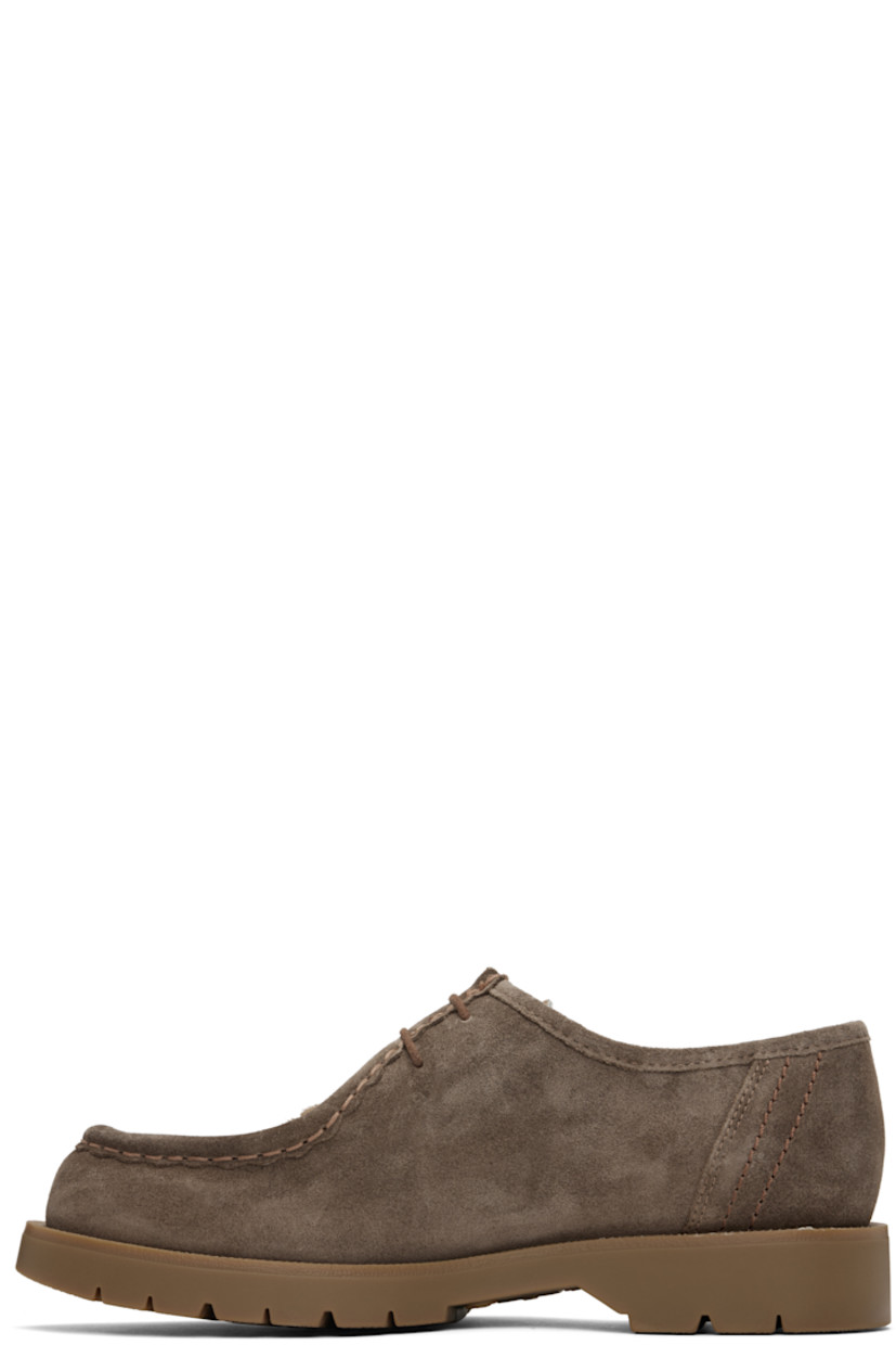 LWG-certified suede and hair-on leather derbys in taupe.

· Scalloped edge at moc toe
· Snake pattern at vamp
· Lace-up closure
· Grained leather and microfiber lining
· Serrated detailing at welt
· Treaded rubber sole

Supplier color: Taupe
